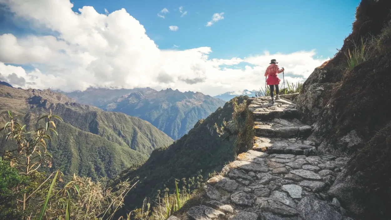 Hiker on an Inca stone path on the Inca Trail