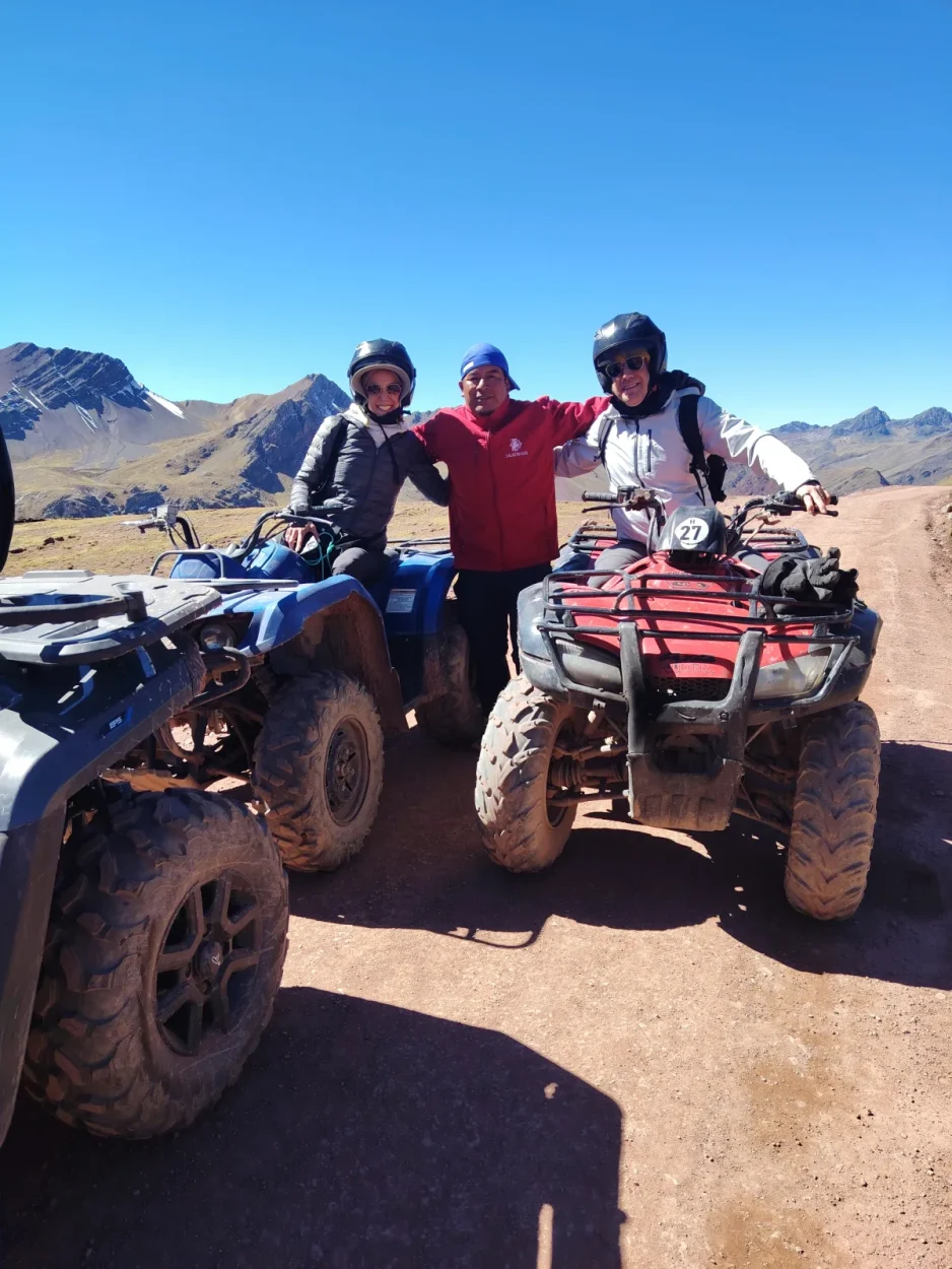 Travelers on ATVs with their Salas Travel guide near Rainbow Mountain, Cusco