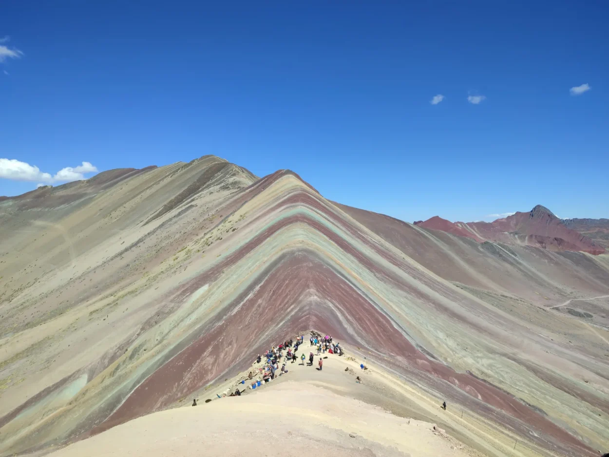 Visitors at the Rainbow Mountain viewpoint