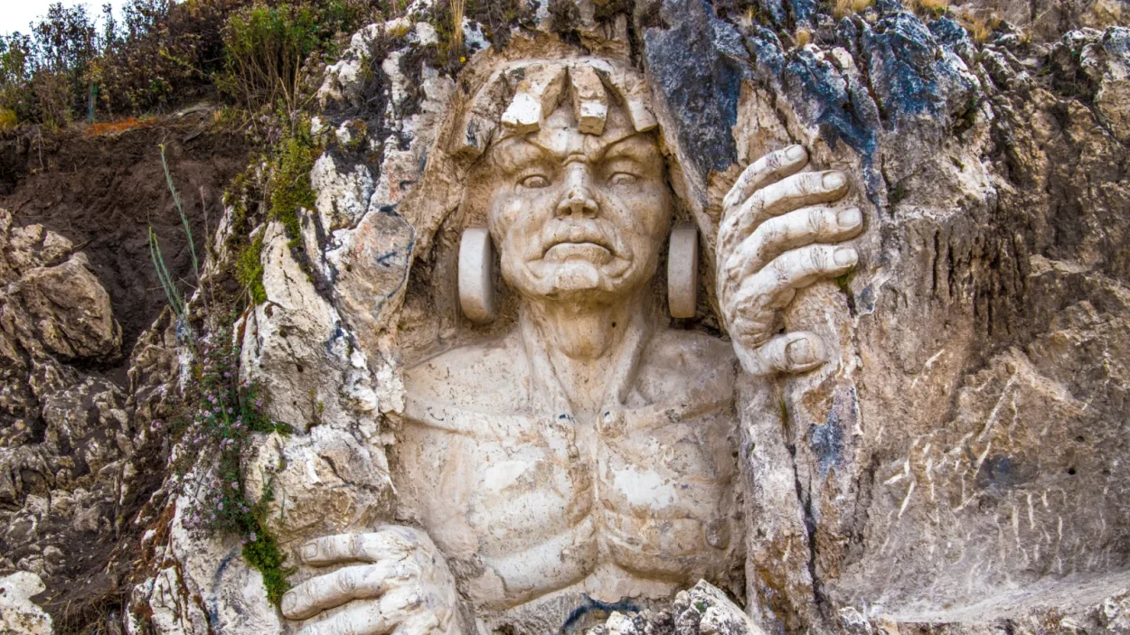 Carved stone face at Apukunaq Tianan, the Abode of the Gods, near Cusco
