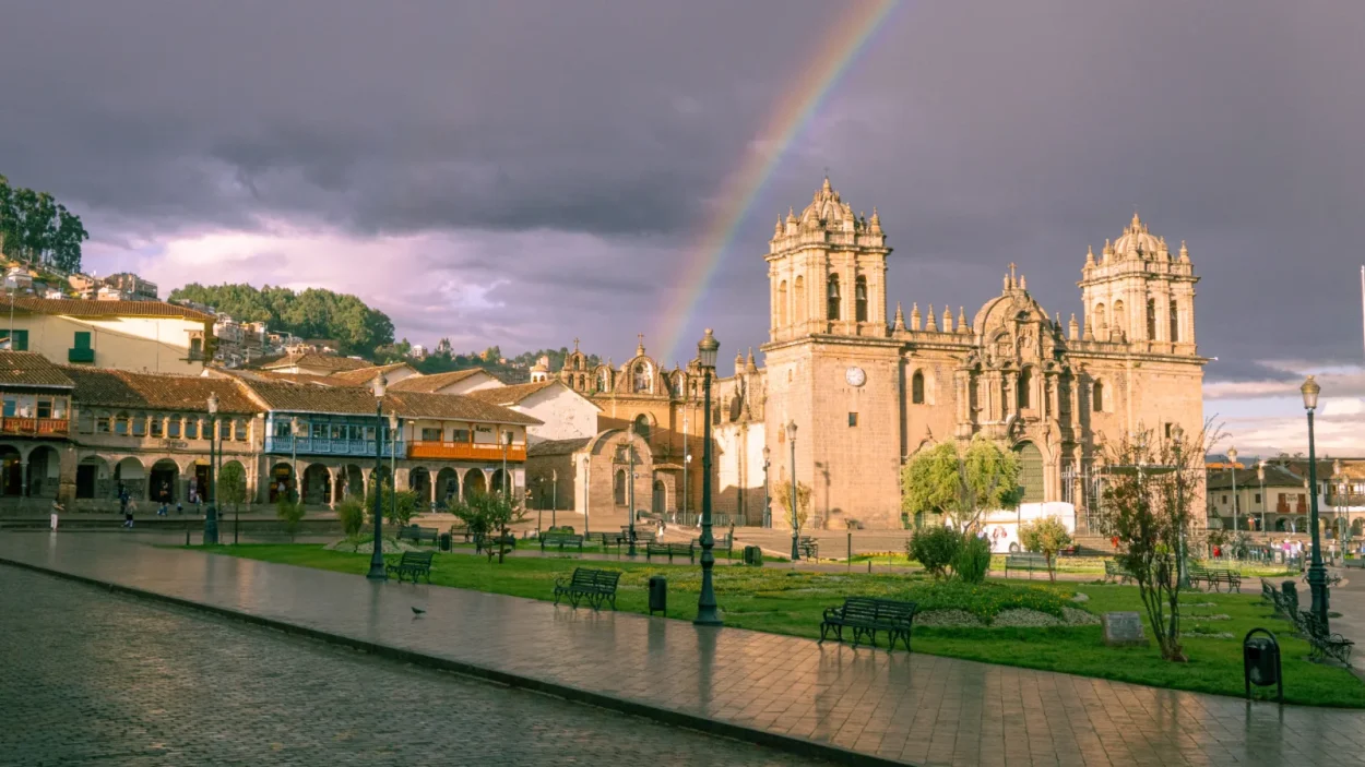 Cusco Cathedral and Plaza de Armas with a rainbow