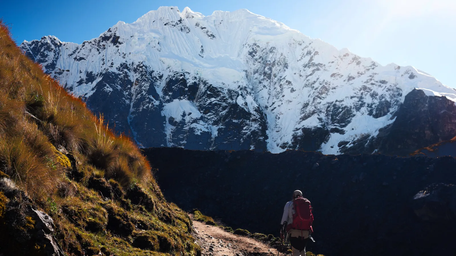 Hiker below the glaciers of Salkantay